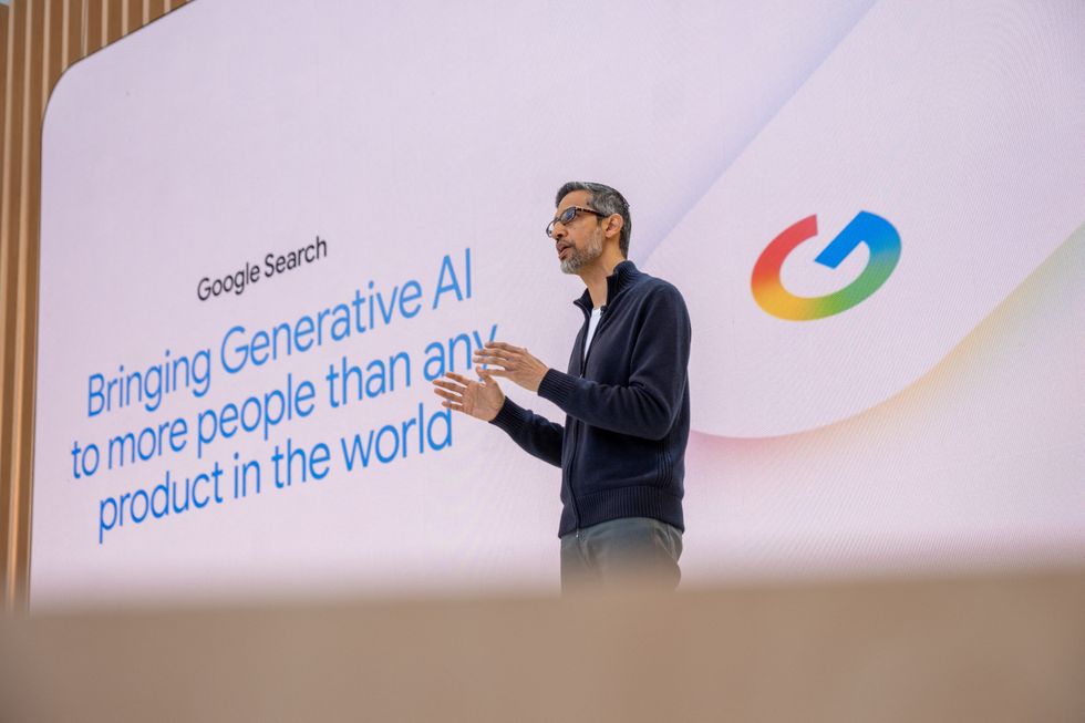 Google CEO \u200bSundar Pichai speaking on-stage at Google I/O 2025 