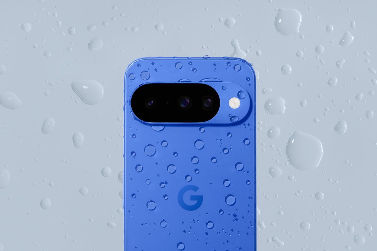 Google Pixel 10 shown in indigo with rain splattering it