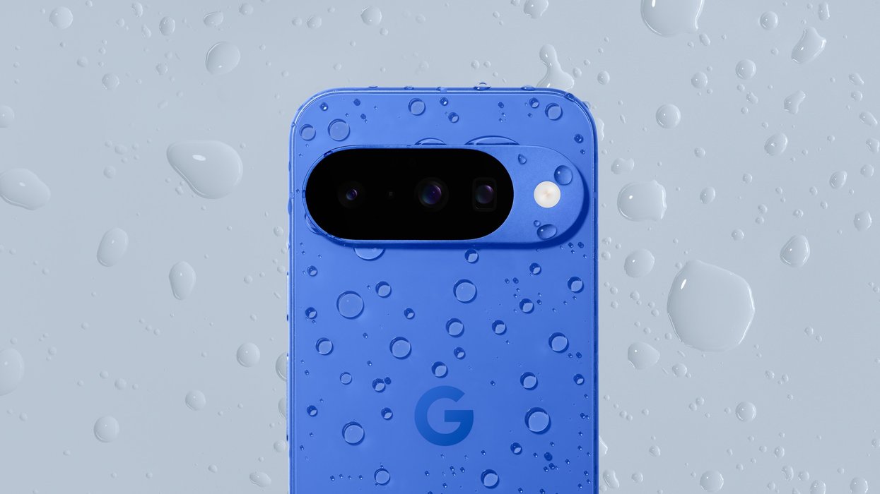 Google Pixel 10 shown in indigo with rain splattering it