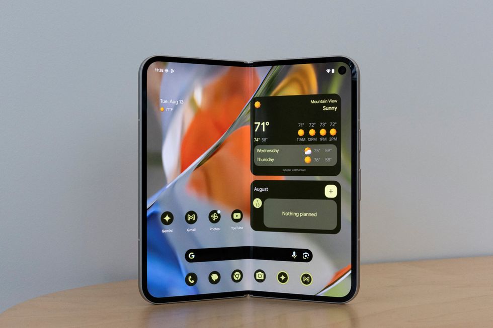 google pixel 9 pro fold pictured folded open on a table