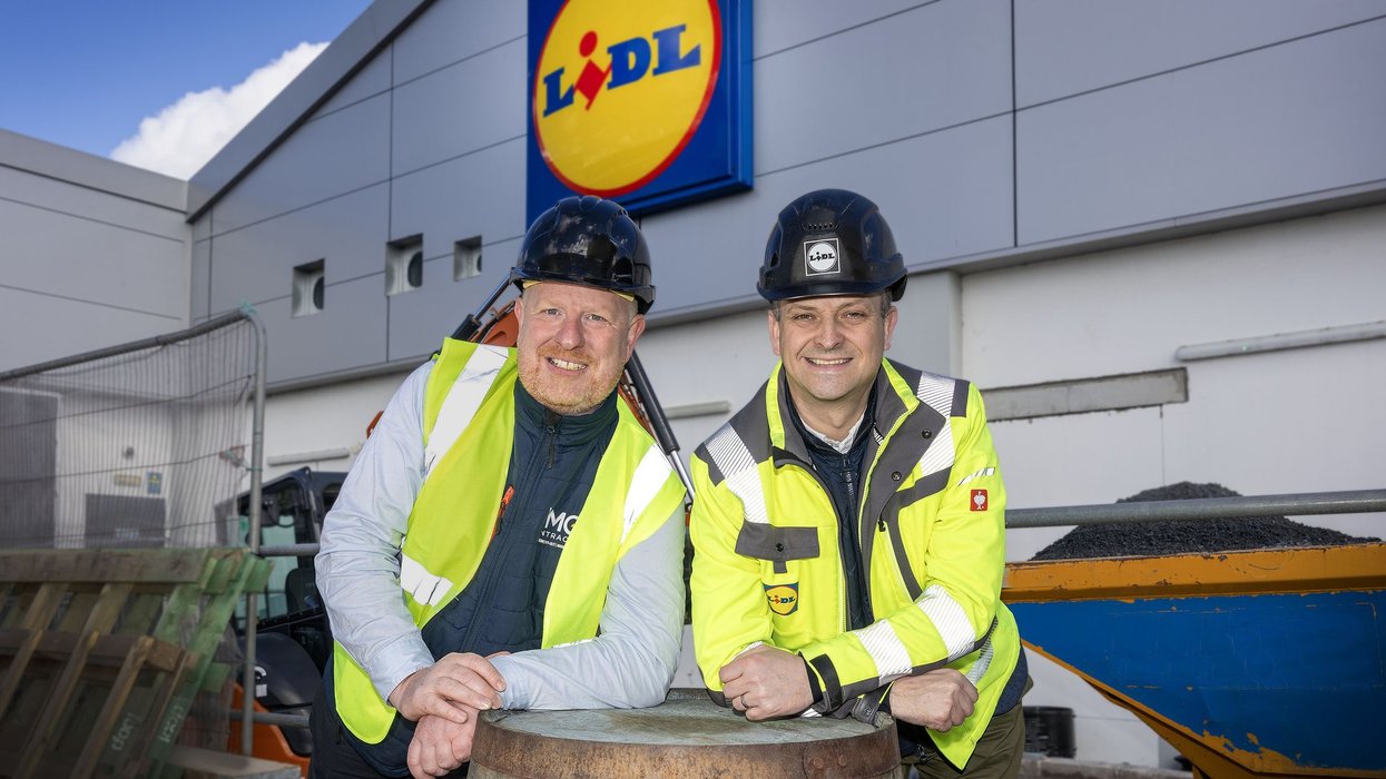 Gordon Cruikshanks and MMG contractor stood outside Lidl