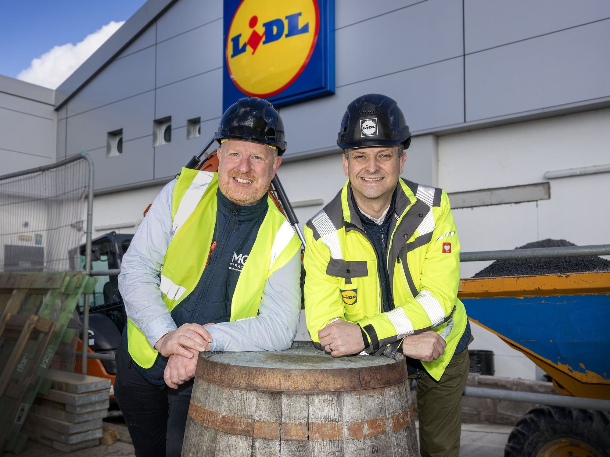 Gordon Cruikshanks and MMG contractor stood outside Lidl