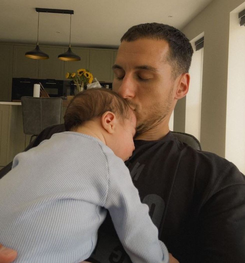 Gorka Marquez kisses his son