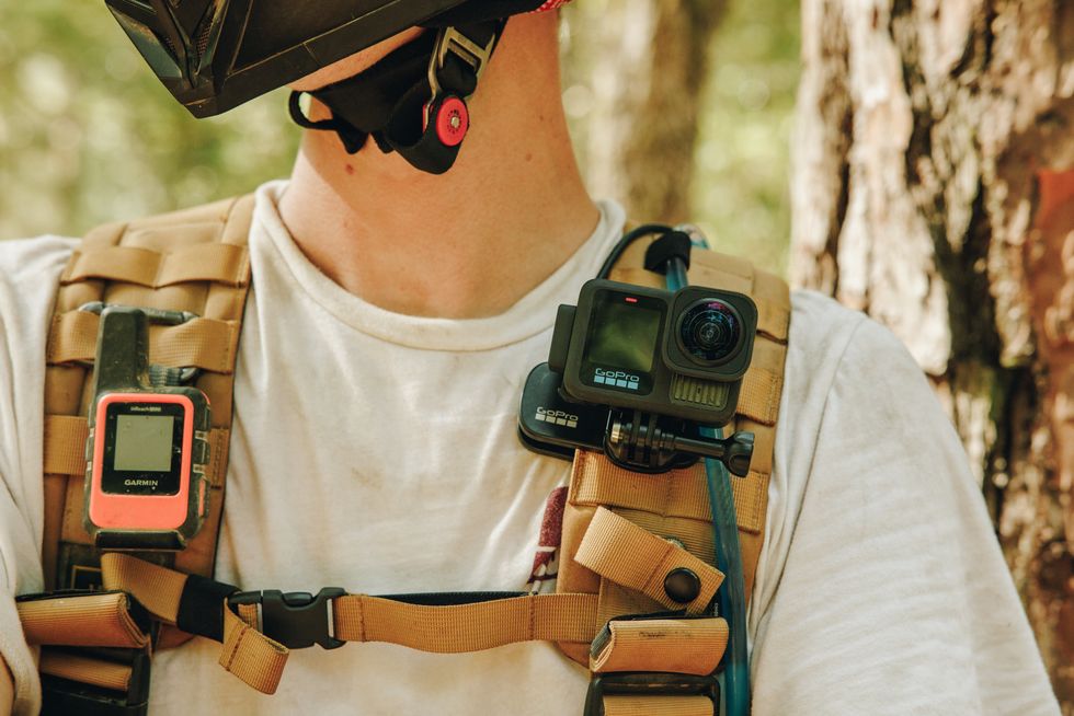 gorpro hero 13 black mounted on a backpack