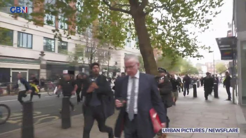 Gove confronted by anti-lockdown protesters in Westminster