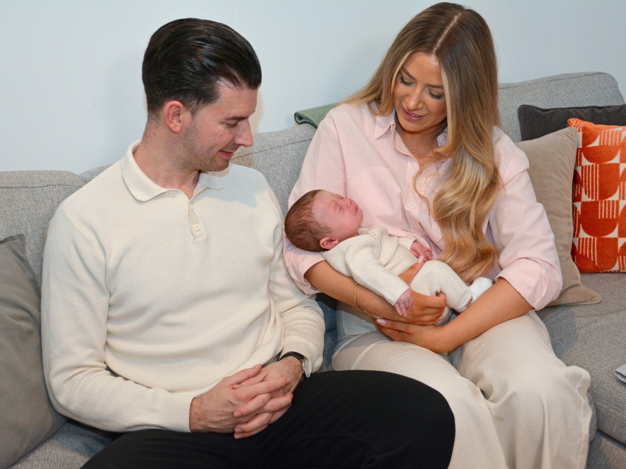 Grace Bell and Steven Powell with their baby son Hugo Powell, 