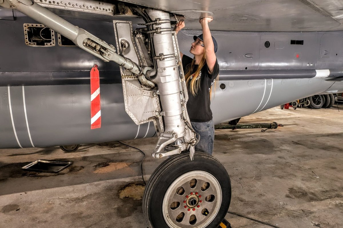 Grace working on the legendary aircraft