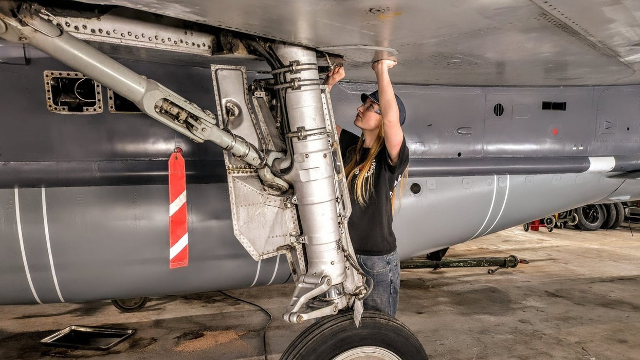 Grace working on the legendary aircraft