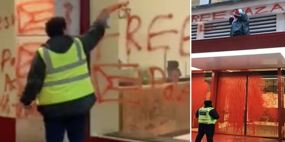 NextImg:Palestine activists hurl red paint over London building and climb onto entrance roof - police on scene