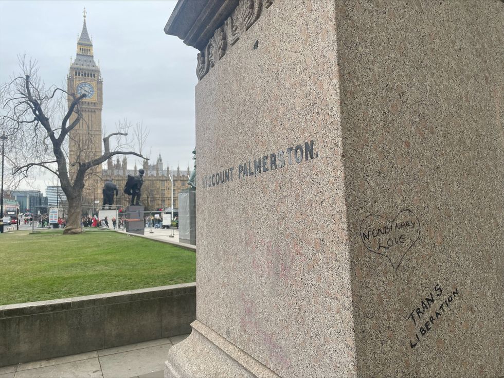 Graffiti left on a statue of Viscount Palmerston in Parliament Square