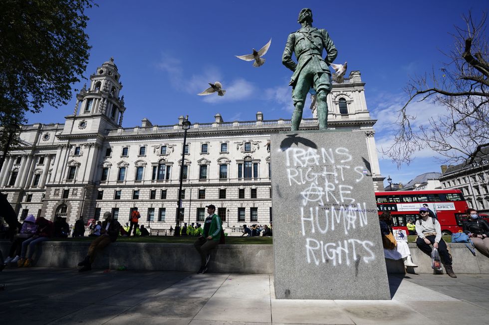 Graffiti left on statues in Parliament Square, London