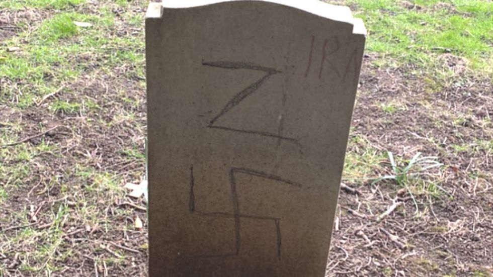 Graffitied gravestones in Ripon Cemetery