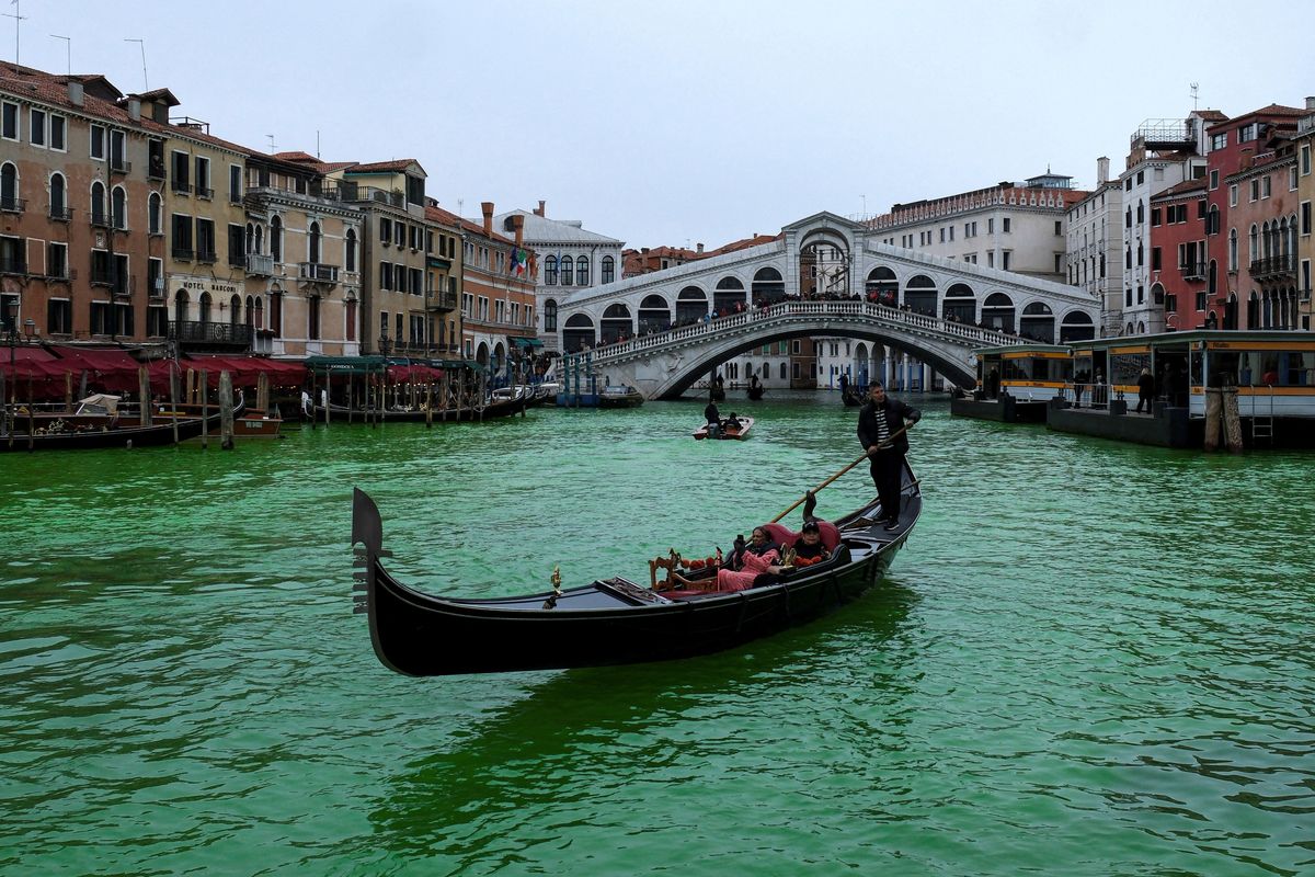 Grand Canal in Venice dyed a bright green