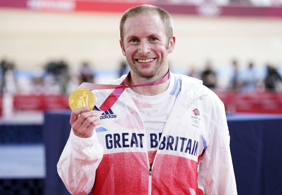 Great Britain's Jason Kenny celebrates with the gold medal in the Men's Keirin Finals to become the first Team GB athlete to win seven Olympic Gold Medals.