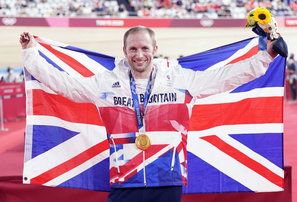 Great Britain's Jason Kenny celebrates with the gold medal in the Men's Keirin Finals to become the first Team GB athlete to win seven Olympic Gold Medals.