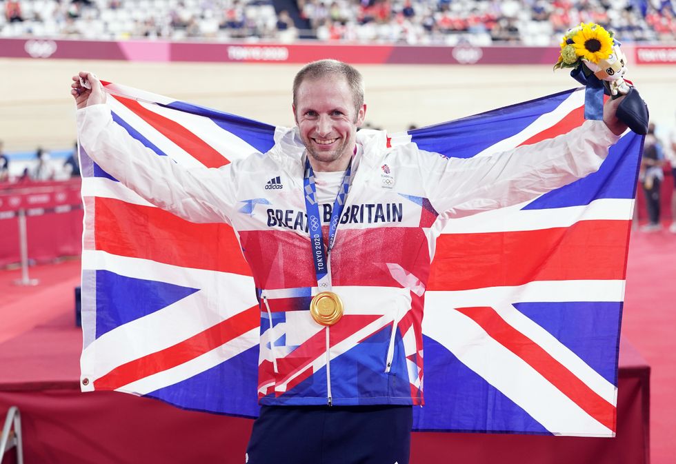 Great Britain's Jason Kenny celebrates with the gold medal in the Men's Keirin Finals to become the first Team GB athlete to win seven Olympic Gold Medals.