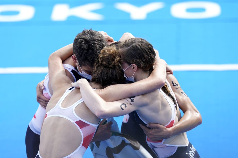 Great Britain's Jonathan Brownlee, Alex Yee, Jessica Learmonth and Georgia Taylor Brown celebrate gold in the Triathlon Mixed Relay at Odaiba Marine Park on the eighth day of the Tokyo 2020 Olympic Games in Japan. Picture date: Saturday July 31, 2021.