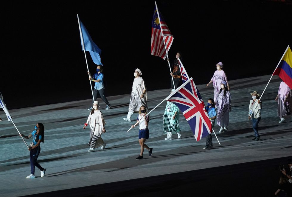 Great Britain's Laura Kenny carrying the Union Jack flag during the closing ceremony of the Tokyo 2020 Olympic Games at the Olympic stadium in Japan. Picture date: Sunday August 8, 2021.