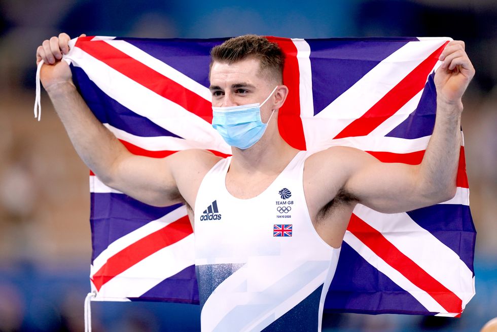 Great Britain's Max Whitlock celebrates after winning the gold medal in the Men's Pommel Horse Final at the Ariake Gymnastics Centre on the ninth day of the Tokyo 2020 Olympic Games in Japan. Picture date: Sunday August 1, 2021.