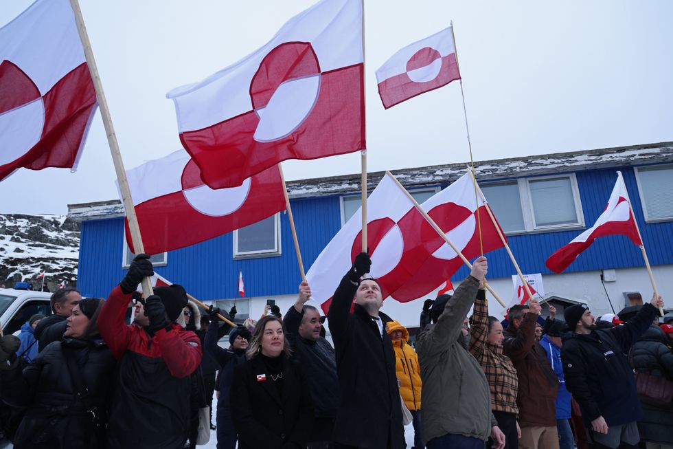 Greenlanders waving flag