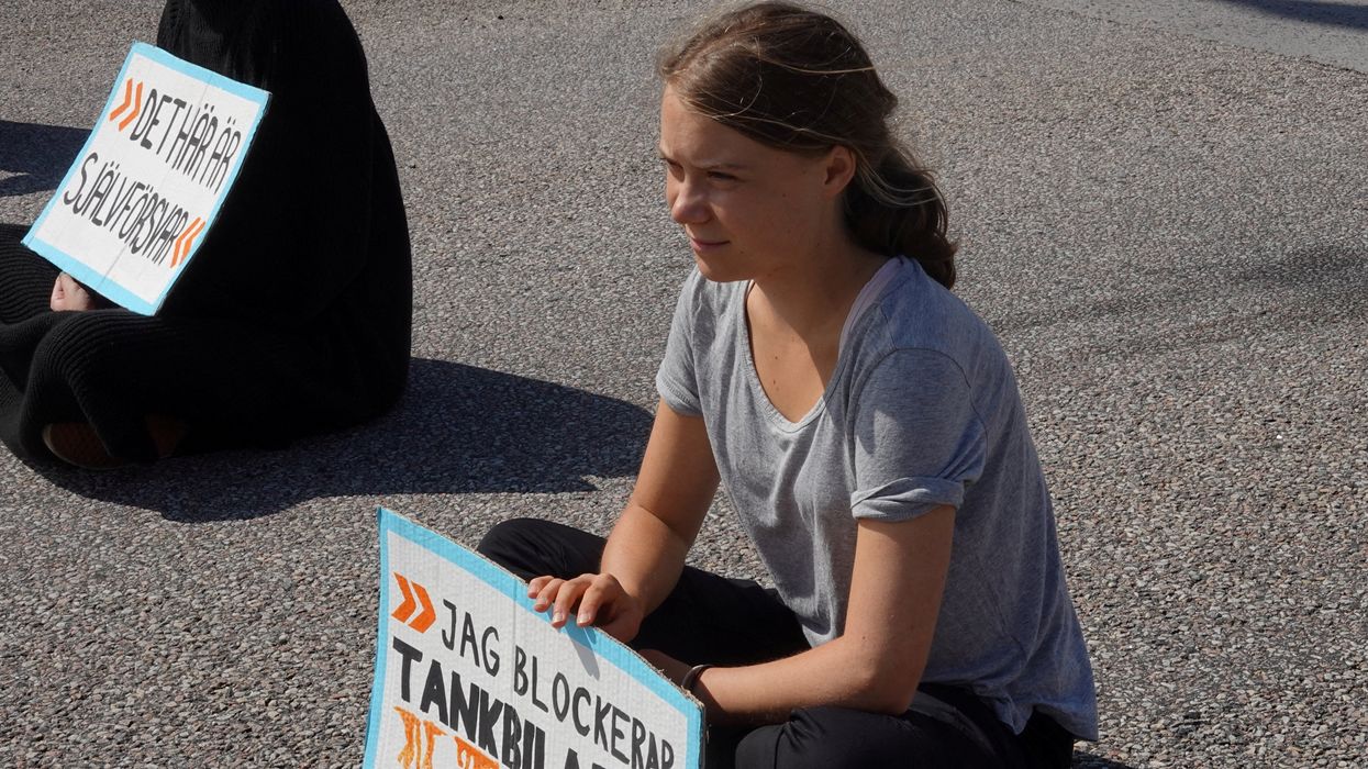 Greta Thunberg protesting