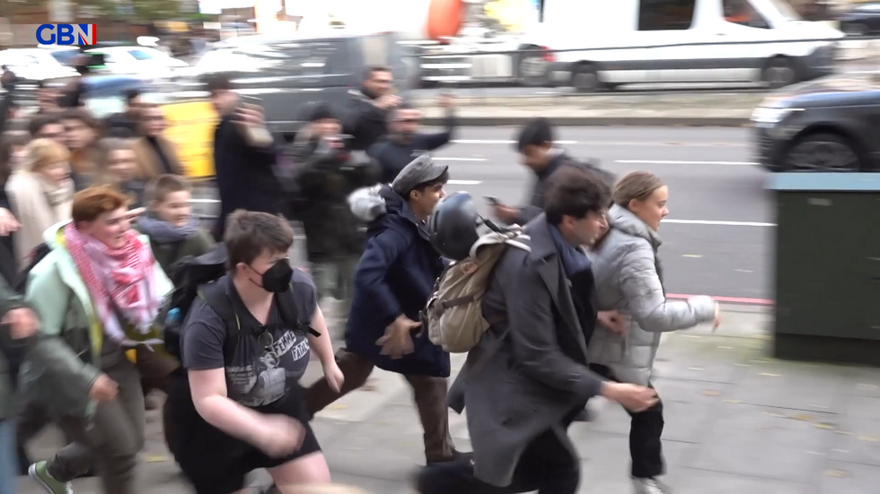 Greta Thunberg runs away from crowds outside court