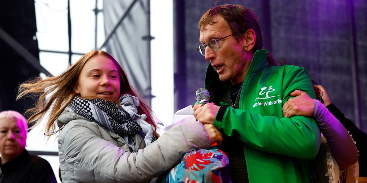 NextImg:WATCH: Greta Thunberg wrestles with activist as he storms her pro-Palestinian rant at climate protest
