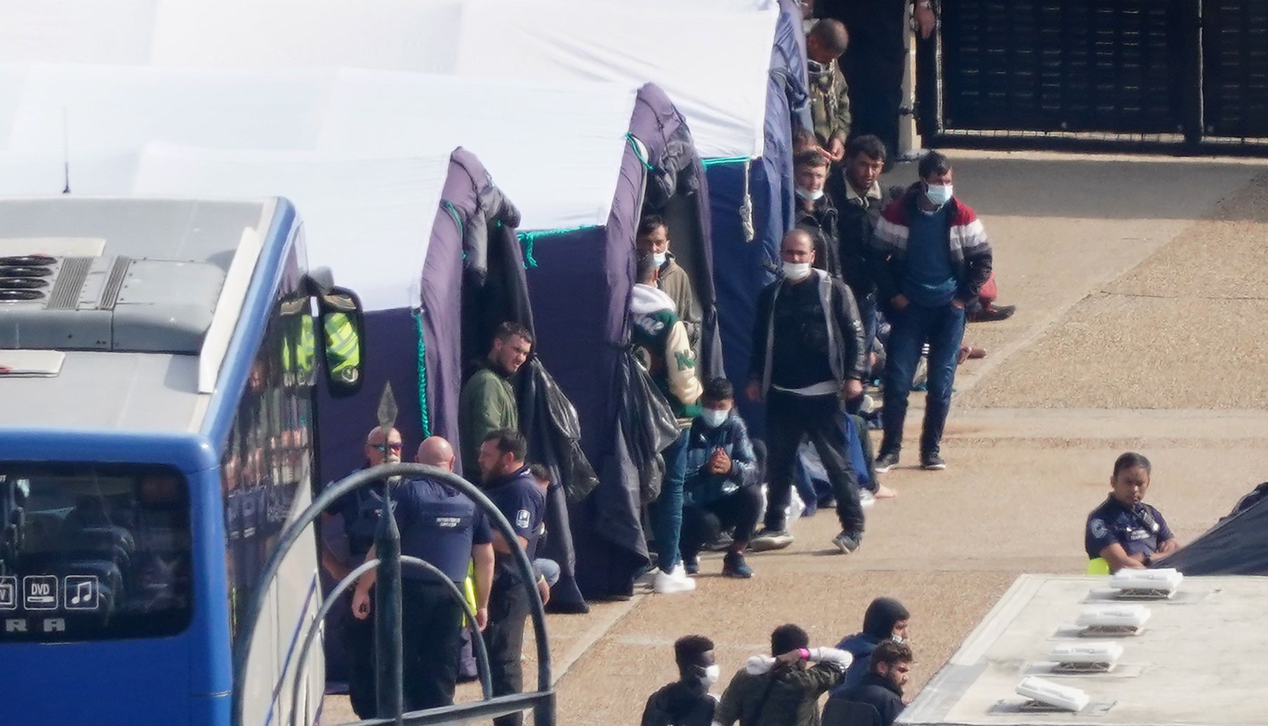 Groups of people thought to be migrants are housed in tents after being brought in to Dover, Kent, from Border Force vessels following a number of small boat incidents in the Channel.