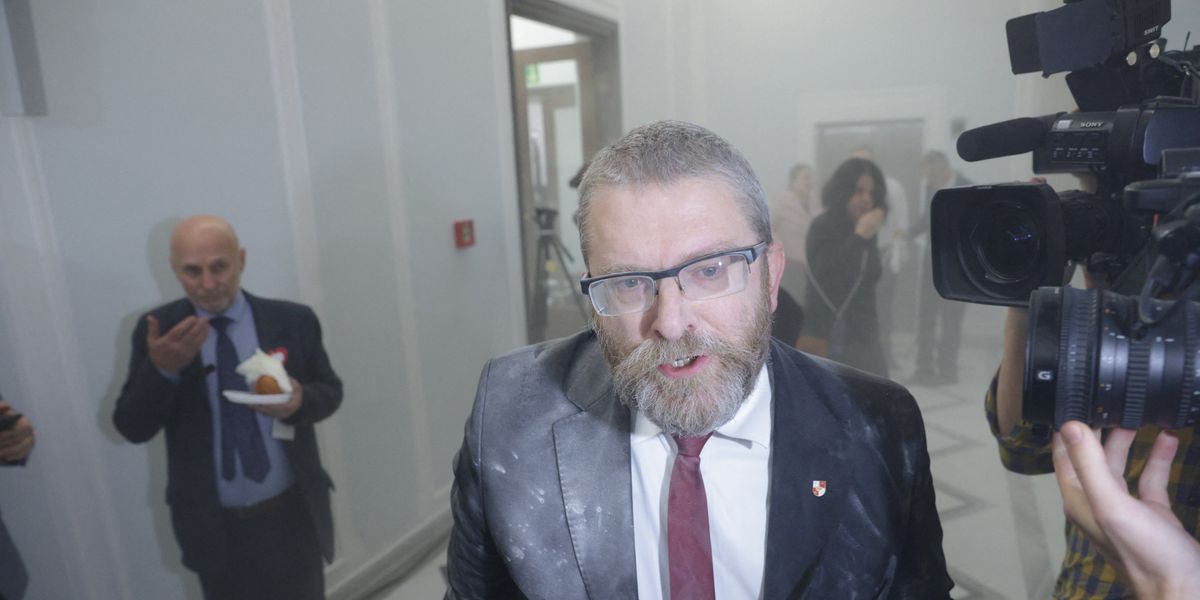 NextImg:Poland: Far right MP in horrific antisemitic attack as he uses fire extinguisher to put out Hanukkah candles