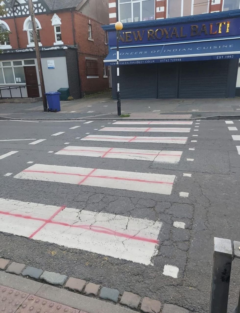 Gt George's crosses painted on a zebra crossing