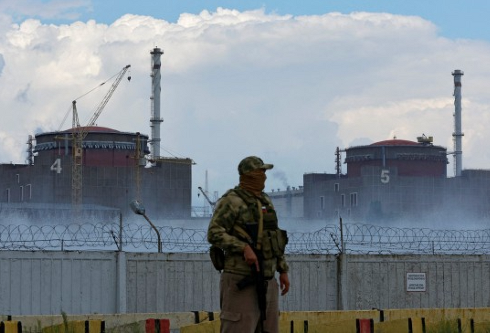 Guard stands outside the nuclear power plant