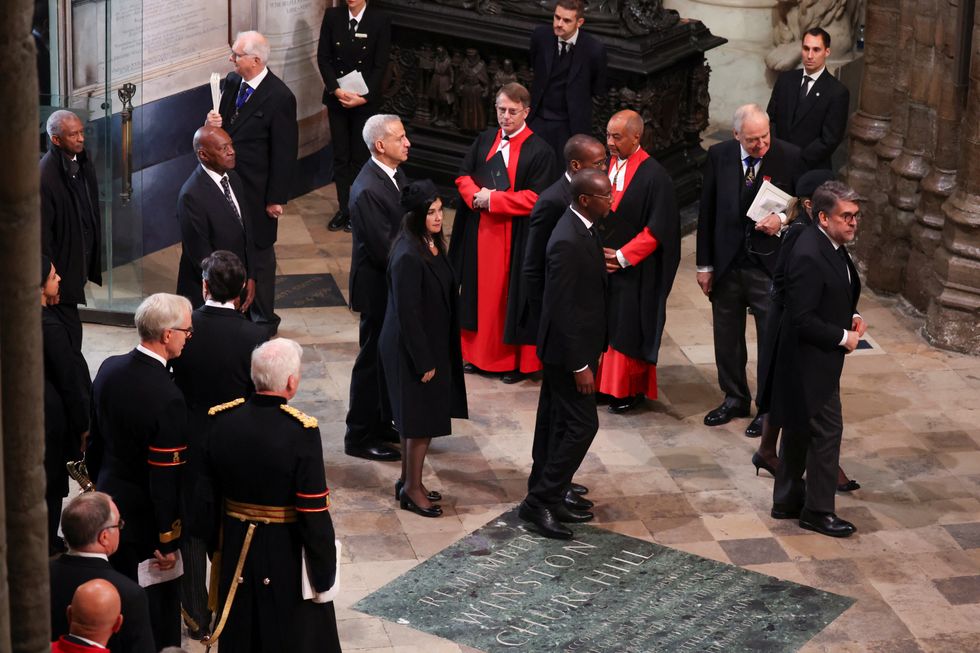 Guests arrive, on the day of the state funeral and burial of Britain's Queen Elizabeth, at Westminster Abbey in London, Britain, September 19, 2022. REUTERS/Phil Noble/Pool