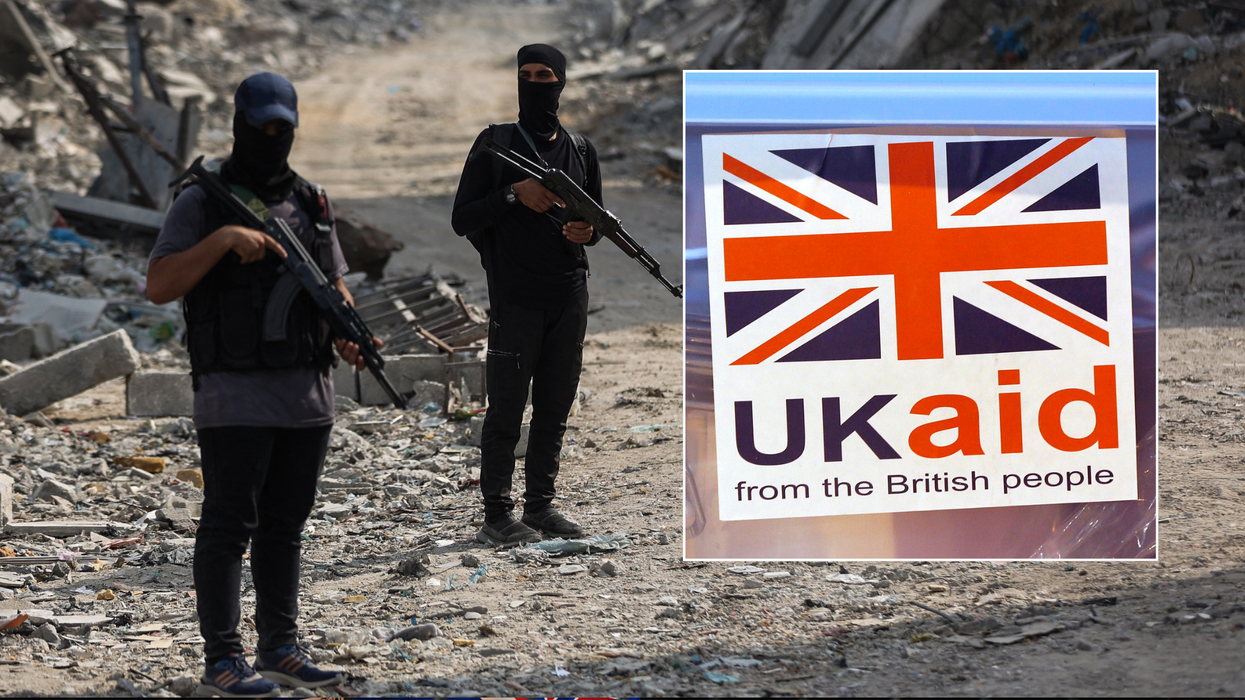 Gunmen in Gaza / UK Aid sign