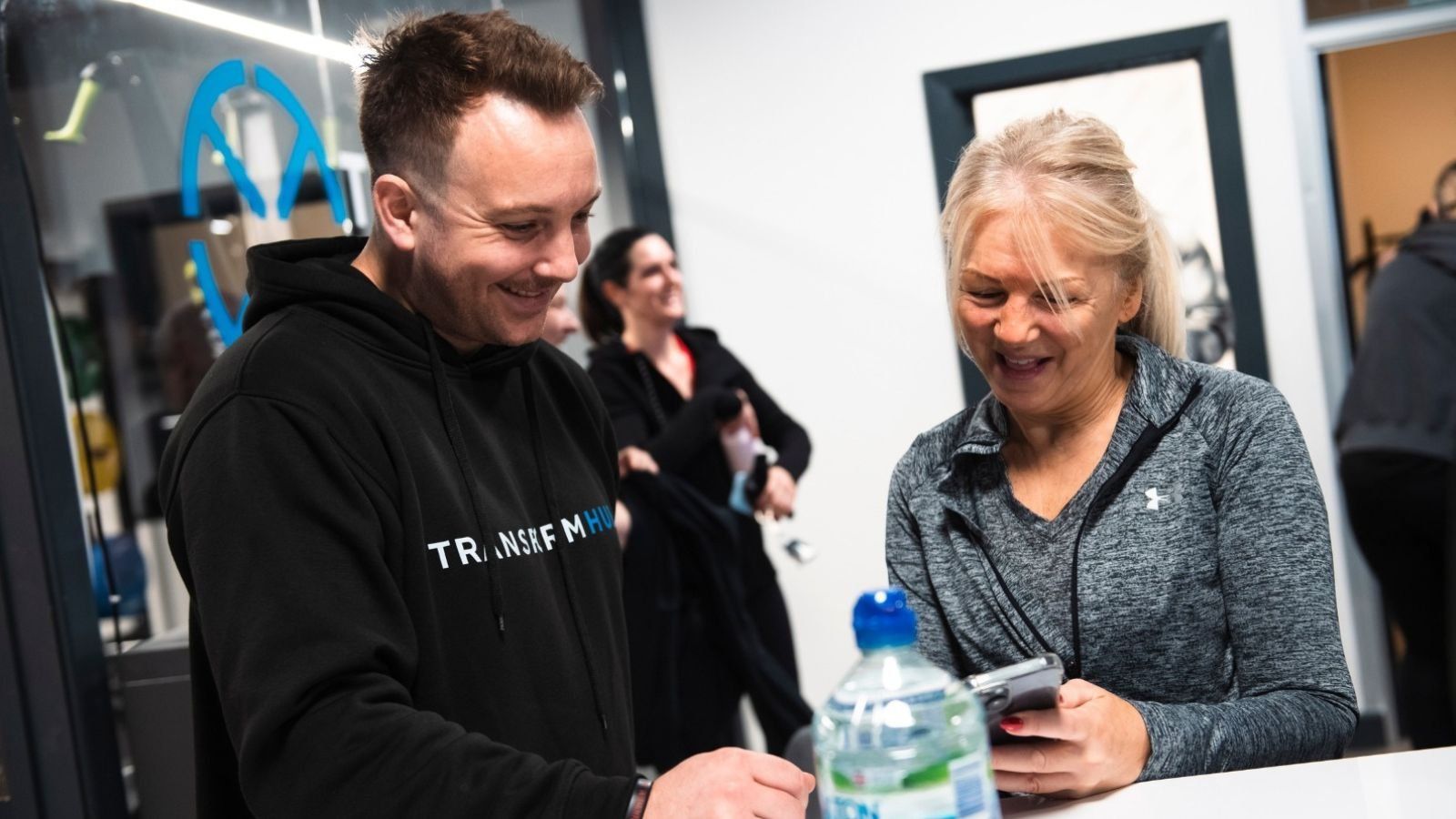 Gym-goers signing up at Transform Hub