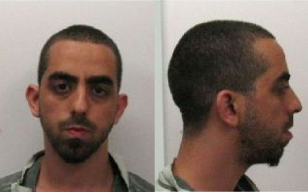 Hadi Matar of Fairview, New Jersey, who pleaded not guilty to charges of attempted murder and assault of acclaimed author Salman Rushdie, appears in booking photographs at Chautauqua County Jail in Mayville, New York, U.S. August 12, 2022. Chautauqua County Jail/Handout via REUTERS. THIS IMAGE HAS BEEN SUPPLIED BY A THIRD PARTY.