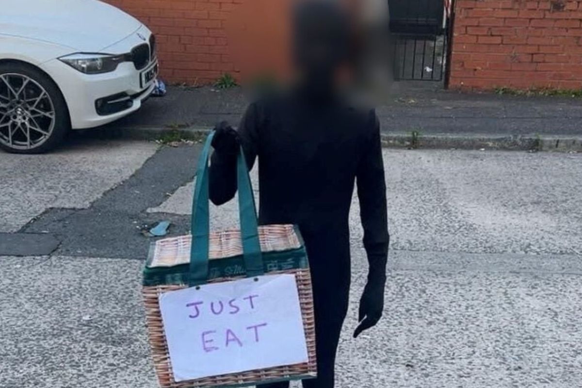 Halloween racism row erupts after British schoolboy dressed up as Just Eat delivery driver in black bodysuit