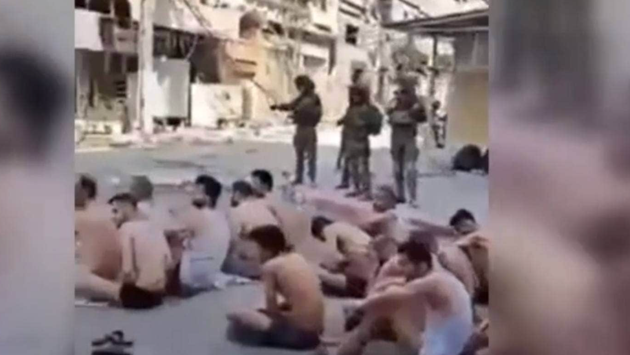 Israel rounds up Hamas suspects and strips them down in public on streets of Gaza