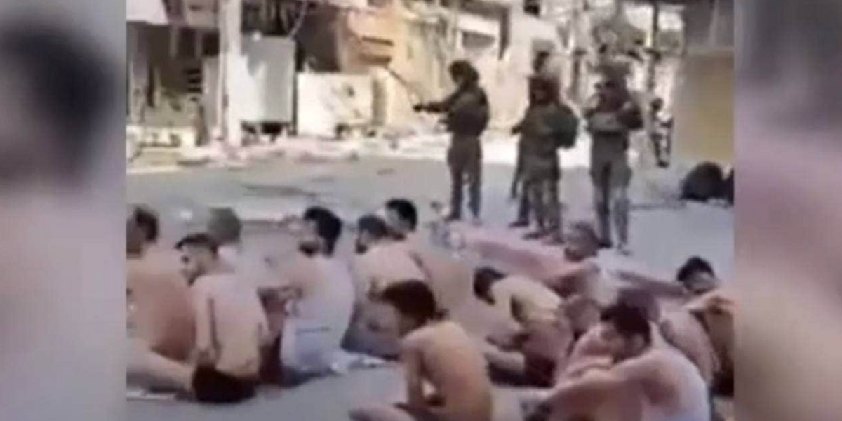 NextImg:Israel rounds up Hamas suspects and strips them down in public on streets of Gaza