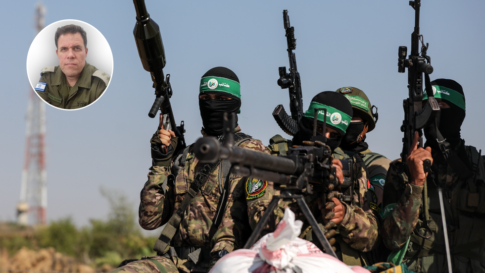Hamas terrorists parade their guns