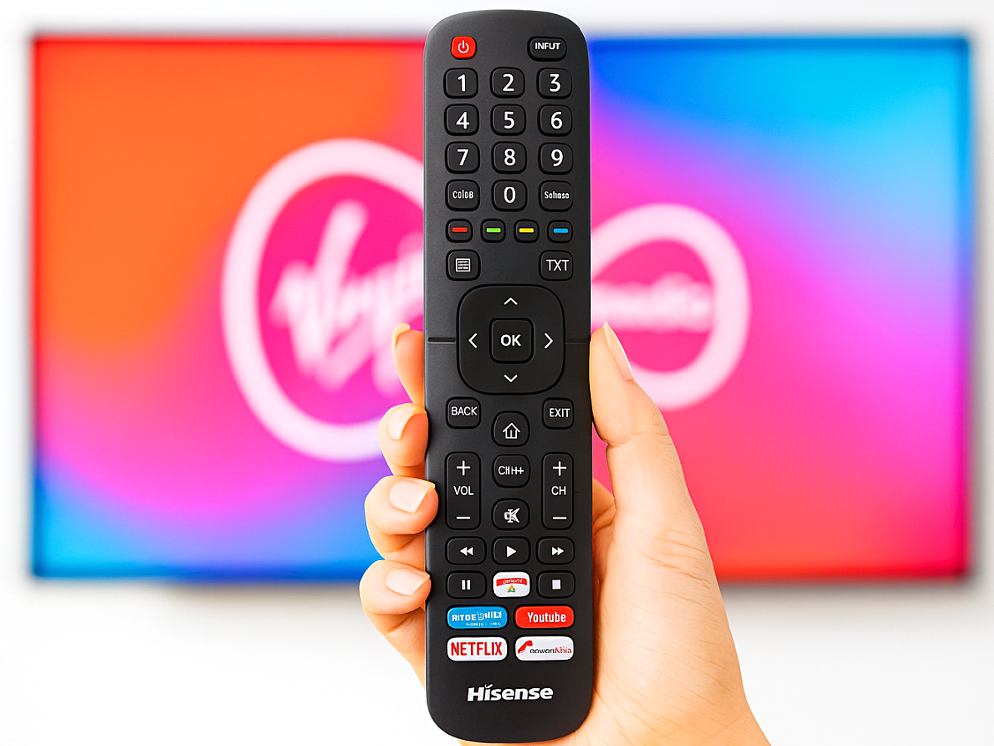 hand holding a hisense tv remote control with virgin media tv in the background