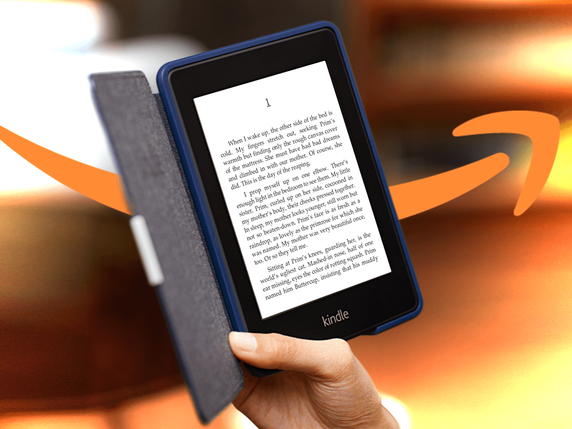 hand holding a Kindle e-readers with a dramatic colourful background