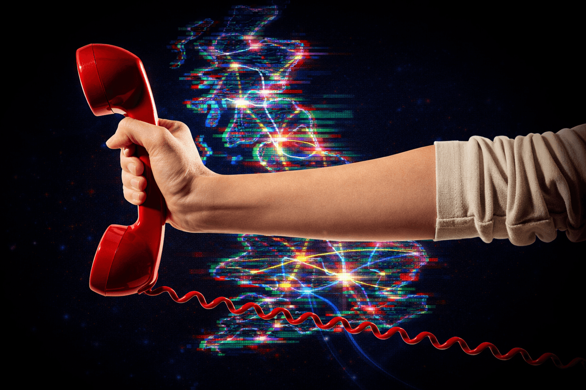 hand holding a traditional landline phone in red with a map of the UK with broadband connections in the background.