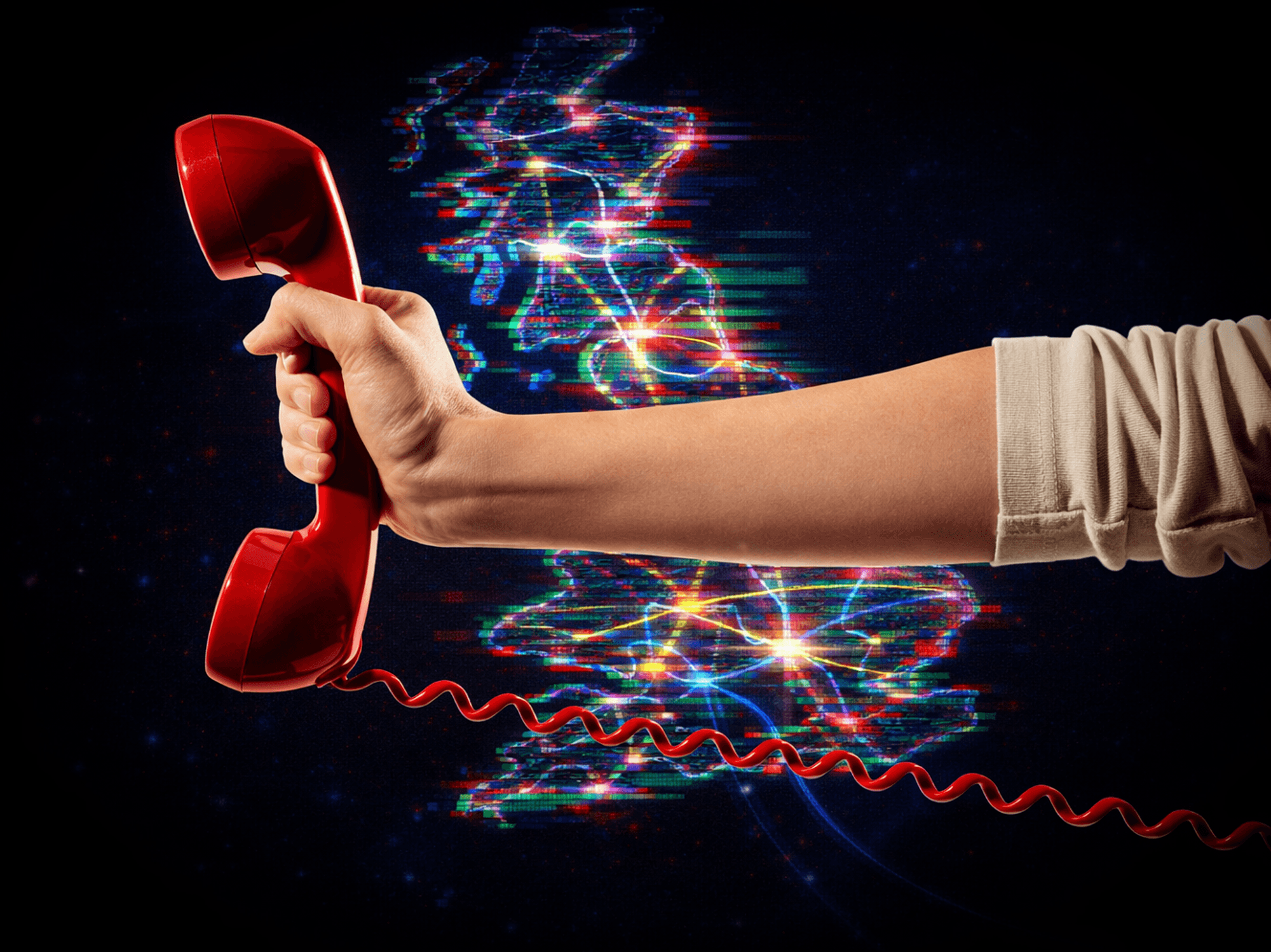 hand holding a traditional landline phone in red with a map of the UK with broadband connections in the background.