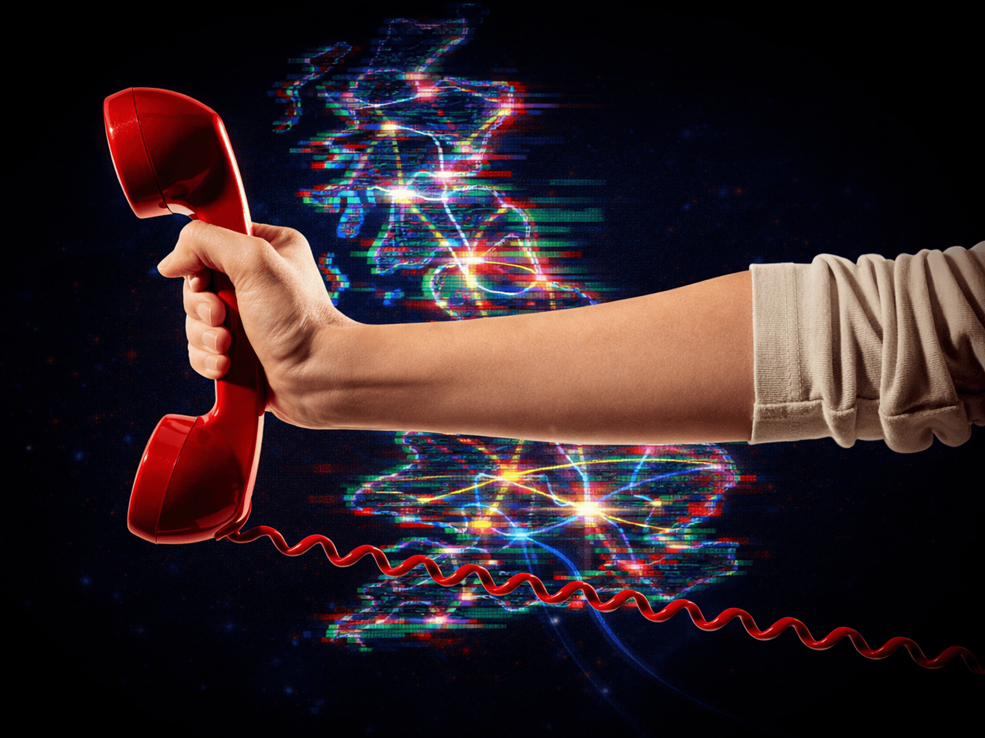 hand holding a traditional landline phone in red with a map of the UK with broadband connections in the background.
