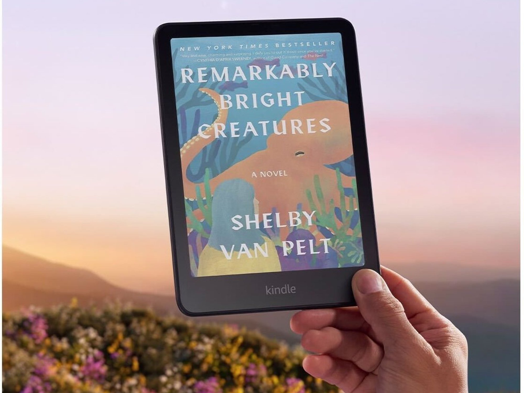 Hand holding Amazon Kindle