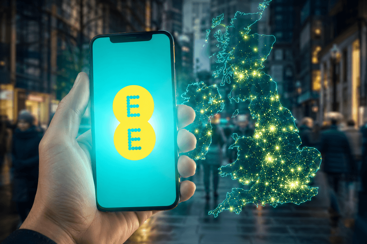 hand holding an ee smartphone with a map of the UK in the background
