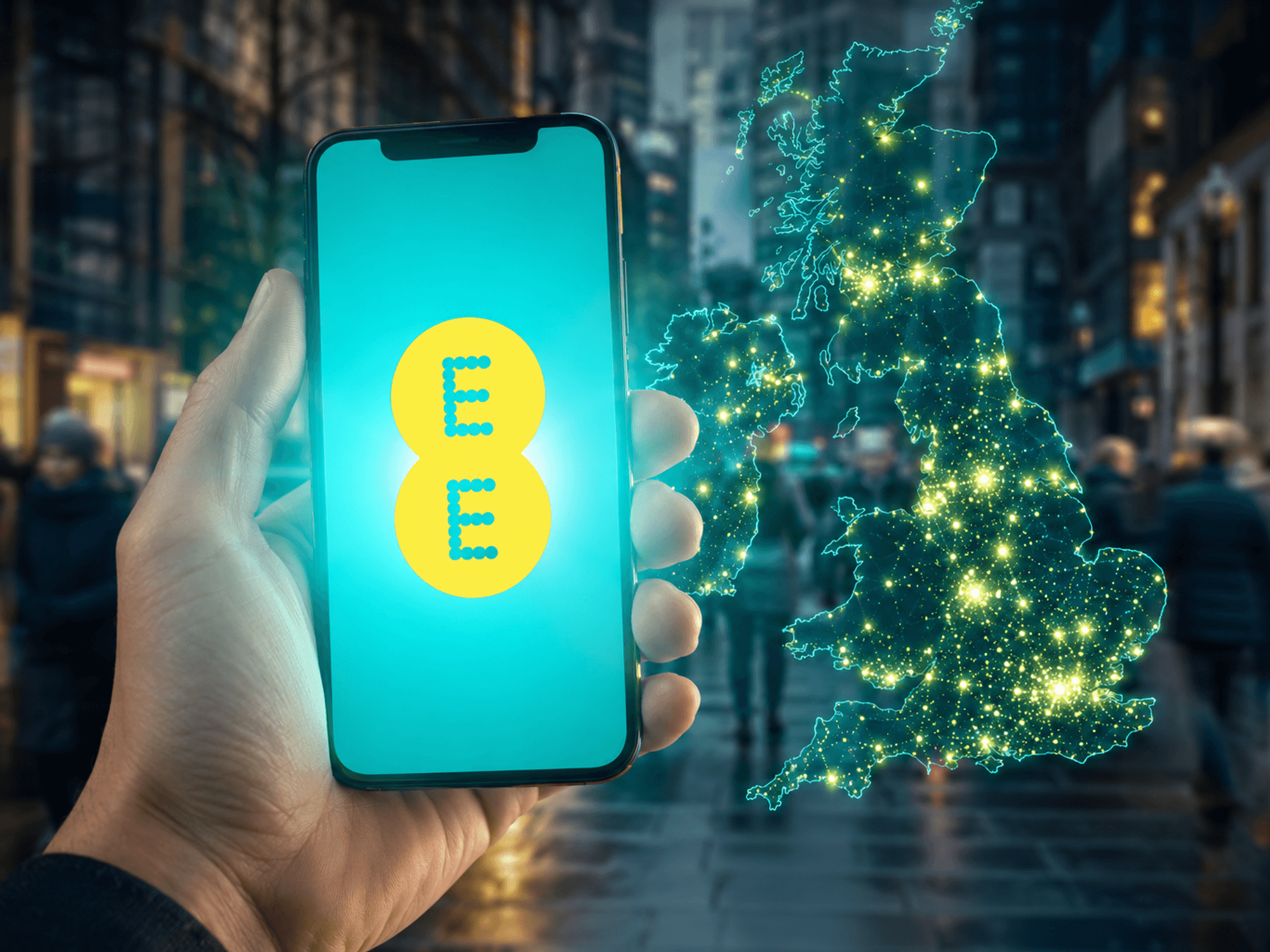 hand holding an ee smartphone with a map of the UK in the background