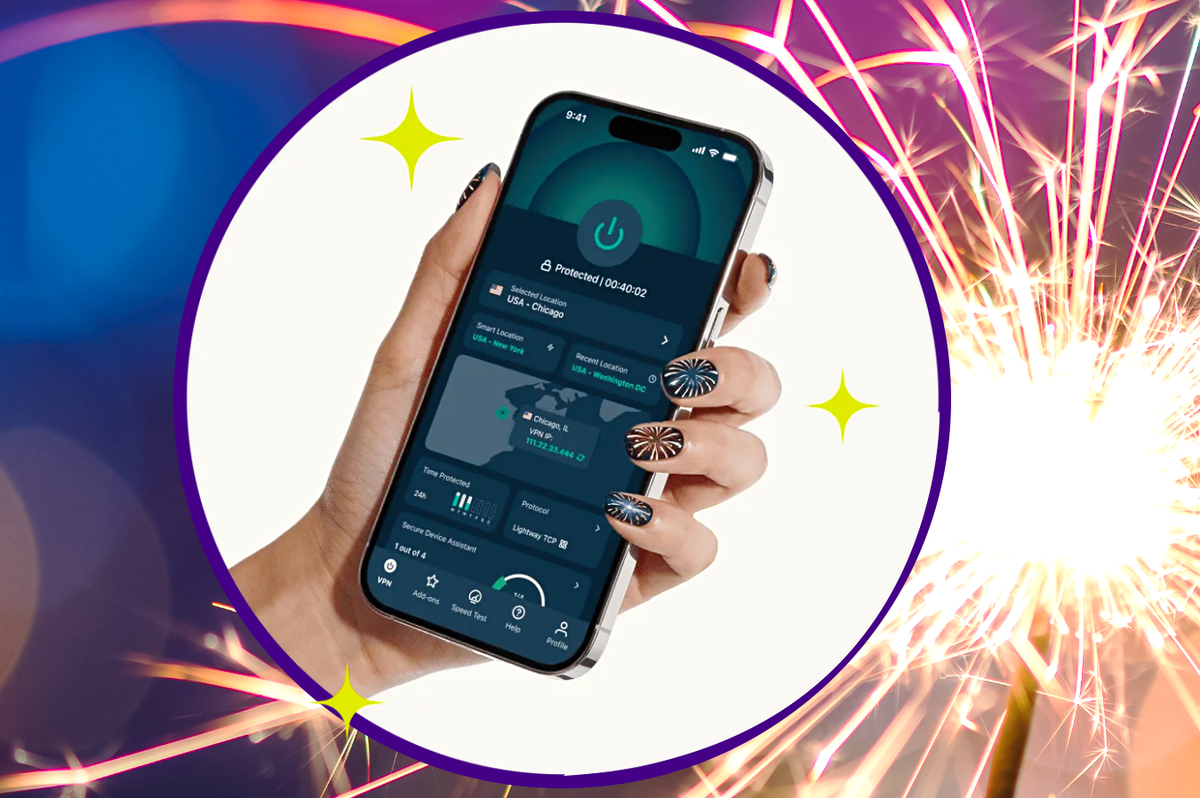hand holding an iPhone running ExpressVPN with fireworks in the background