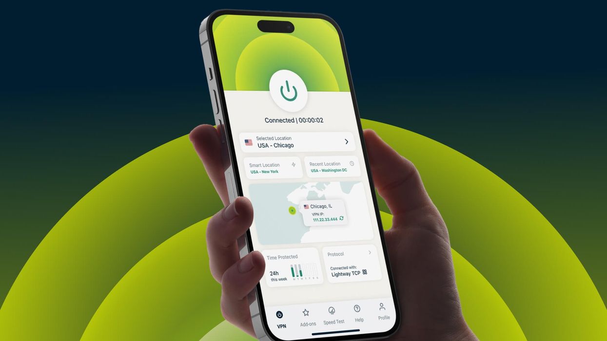 hand holding an iphone with an expressvpn running on-screen