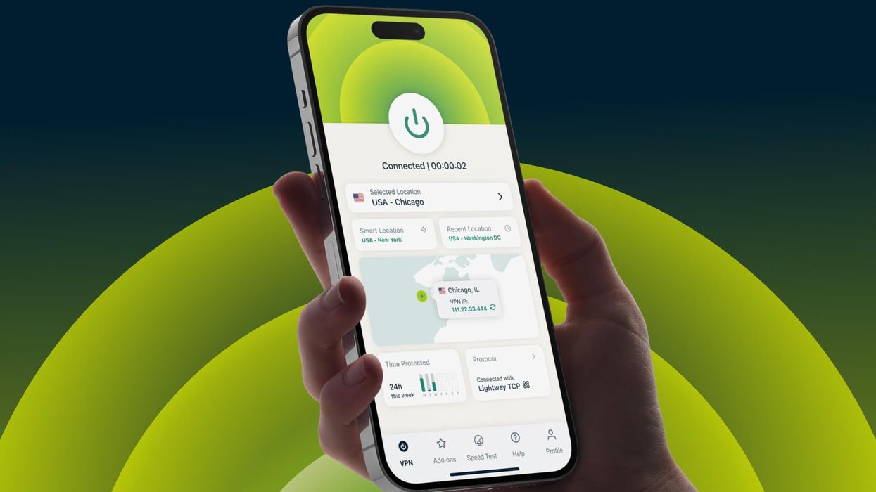 hand holding an iphone with an expressvpn running on-screen
